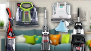 A Collection Of Vacuums And Carpet Cleaners In A Living Room