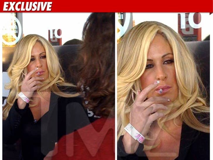 1126_Kim_Zolciak_smoking_WM_EX