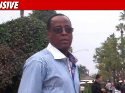 0114_conrad_murray_EX_TMZ_01