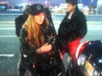0317_lindsay_lohan_jfk_tmz_2