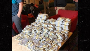 1120_tiger-woods_money-sports-wm