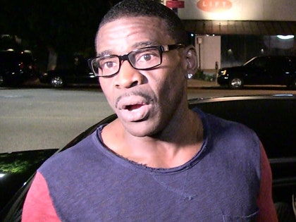 0328_michael-irvin_tmz
