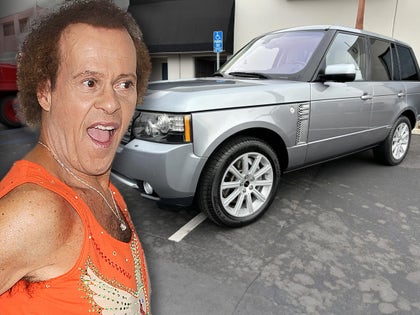 Richard Simmons Smiling Next To His 2012 Range Rover