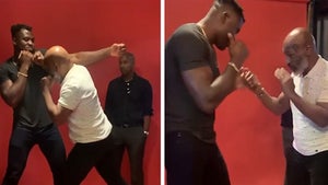 Mike Tyson Shows UFC's Francis Ngannou How to Fight Tyson Fury