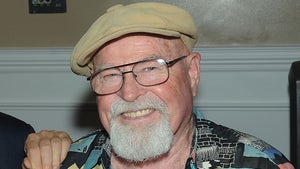 Charles Cyphers Smiling In A Colorful Shirt And Newsie Hat