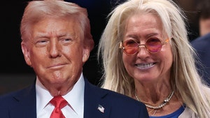 Donald Trump is seen smirking next to Dallas Mavericks co-owner Miriam Adelson.