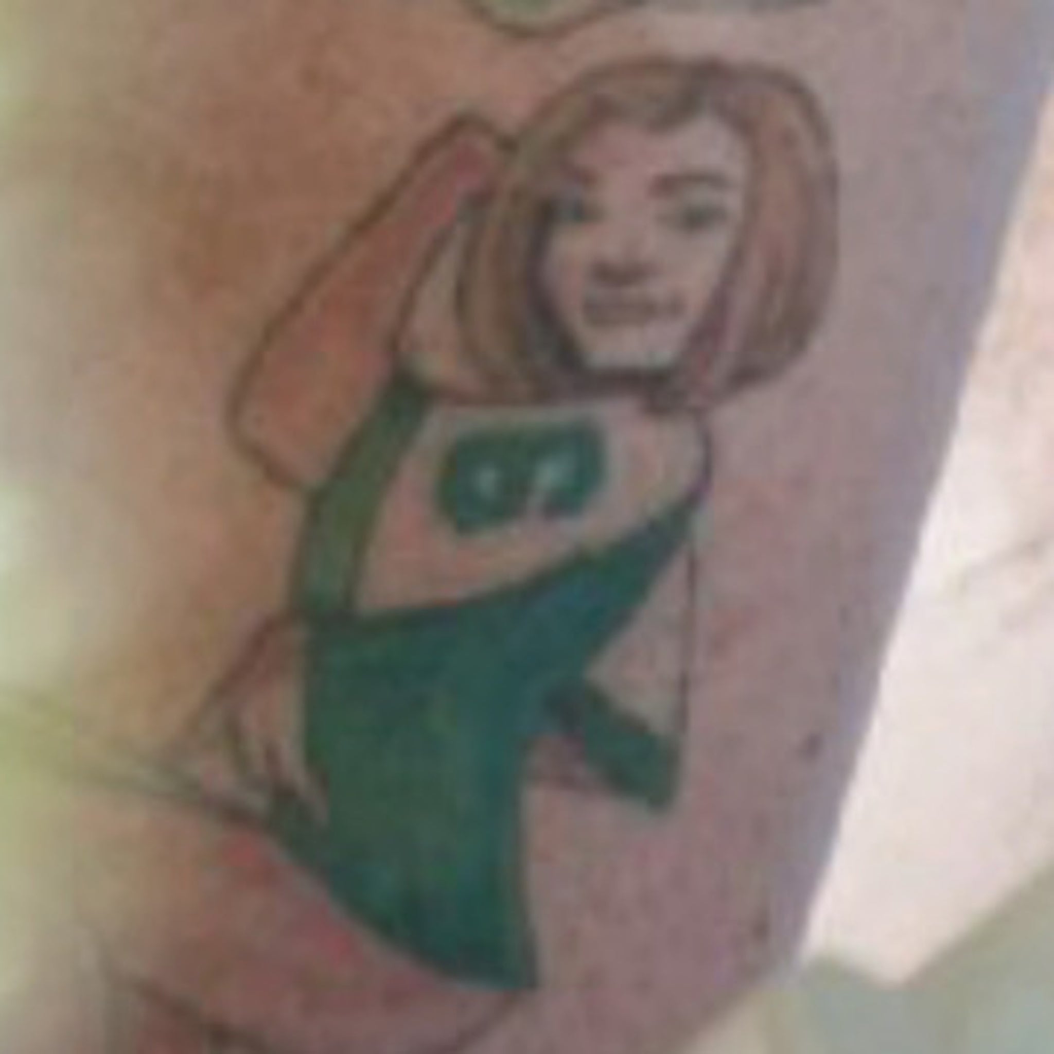Rex Ryan Has A Tattoo Of His Wife In a Mark Sanchez Jersey