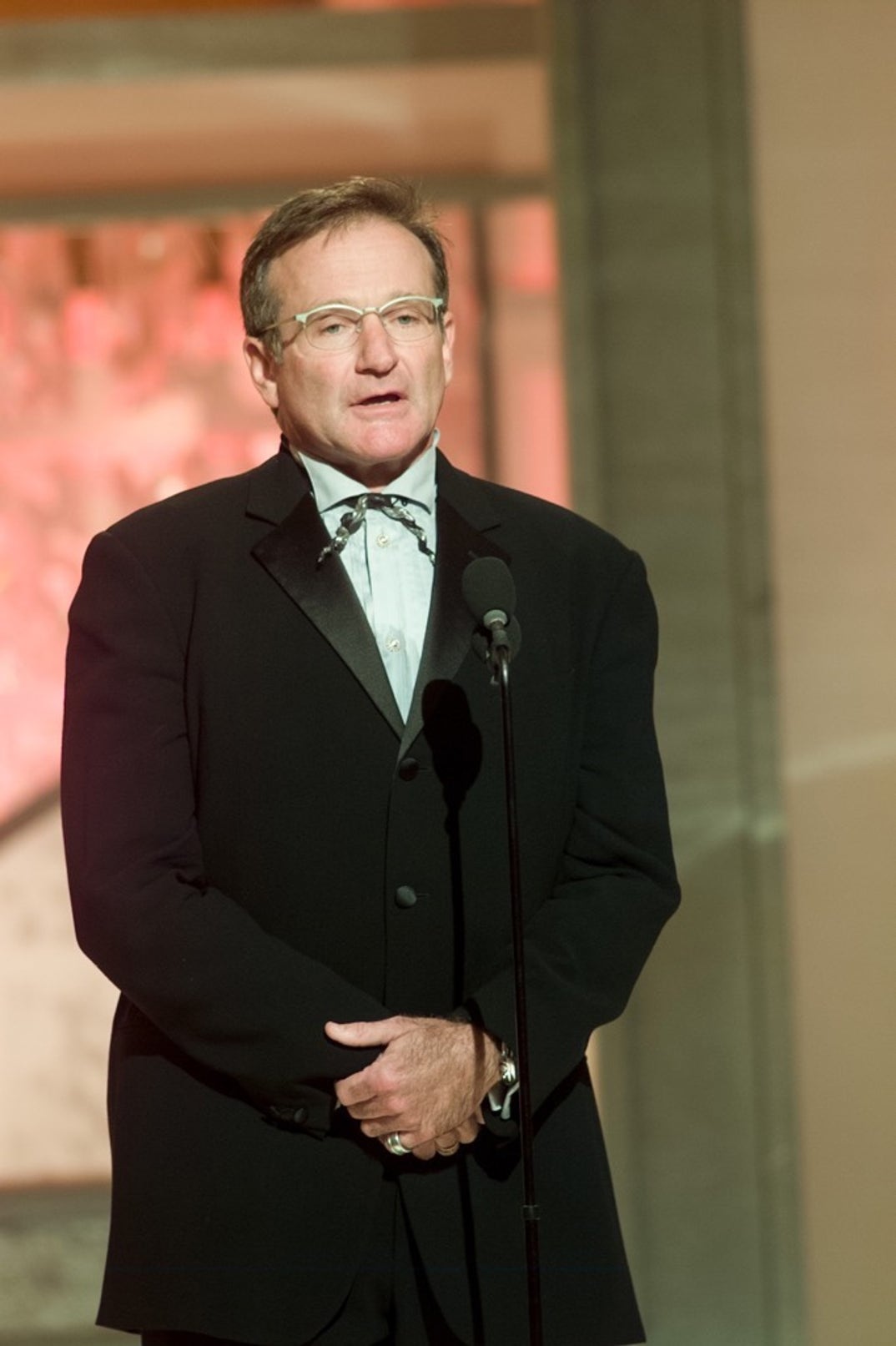 2003 -- Robin Williams presents at the 60th Golden Globes. Here's a spiffy snapshot of him rockin' a tuxedo and cool eyeglasses.