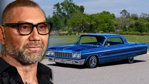 Dave Bautista With His Blue Chevy Impala