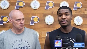 Rick Carlisle and Kam Jones