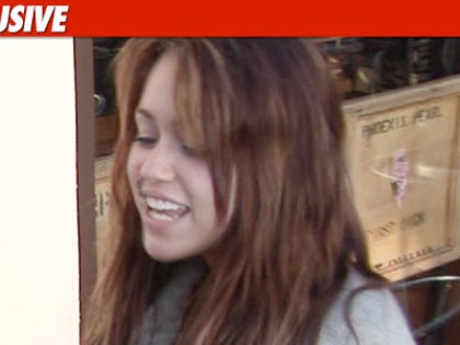 1216_miley_cyrus_tmz_EX