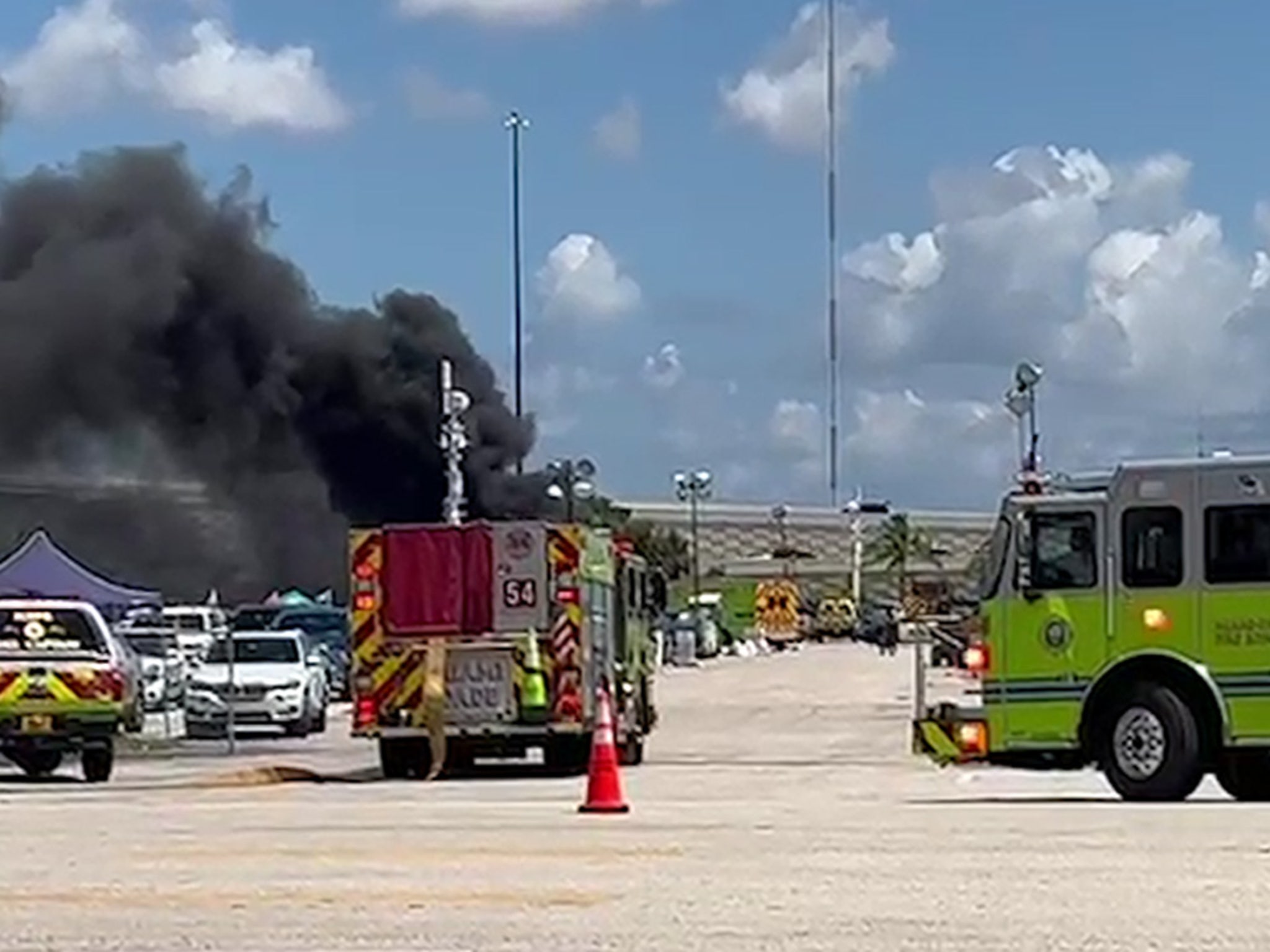 Cars destroyed by fire at Hard Rock Stadium during Patriots-Dolphins