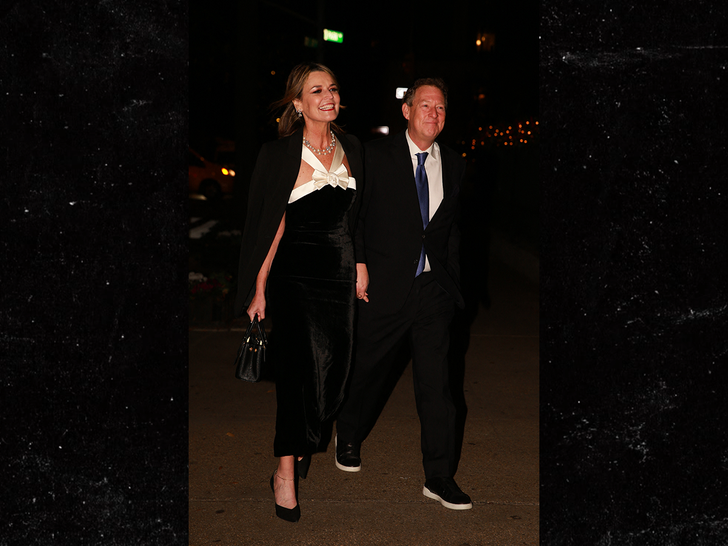 Savanah Guthrie and her husband Michael Feldman seen attending a wedding reception for Jennifer Long & Reid Sterrett