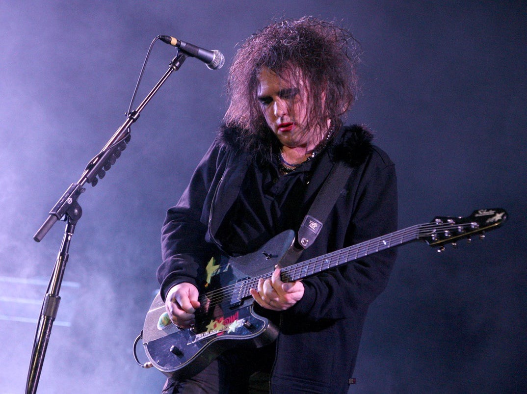 2009: Robert Smith of the band The Cure performs during day three