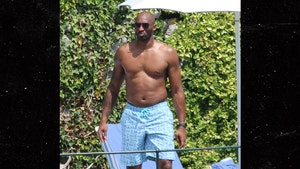 Kobe Bryant's Vacation Dad Bod Is Jacked & Hairless (Update)