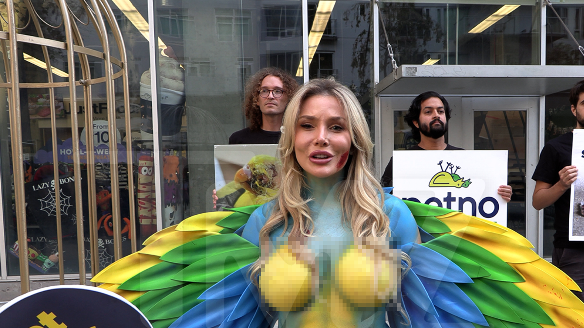Courtney Stodden Strips Down, Gets in Cage Dressed As Bird to Protest Petco