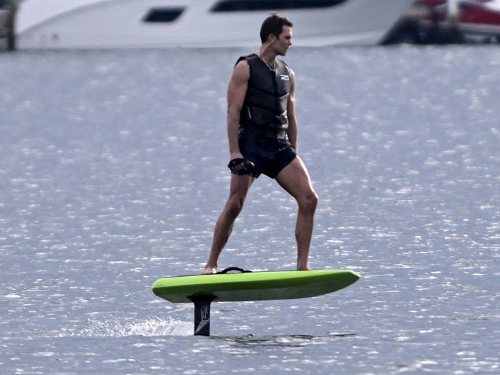 Tom Brady Rides His Electric Surfboard in Miami, Looks Ripped