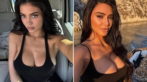 0528-Kylie-Jenner-Kim-Kardashian-Who'd-You-Rather-HERO