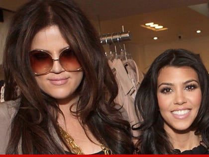 0430_khloe_kourtney_kardashian_getty