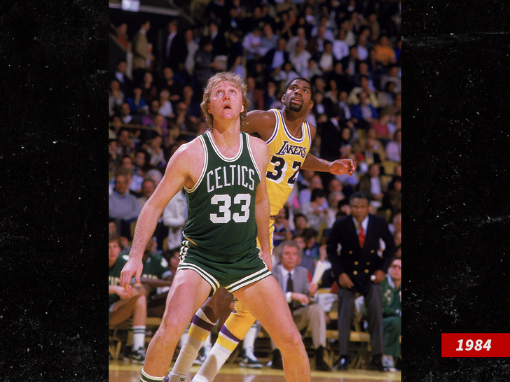 Larry Bird in action, boxing out vs Los Angeles Lakers Magic Johnson