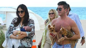 Simon Cowell -- 10-Day-Old Eric Flies and Soaks in Rays