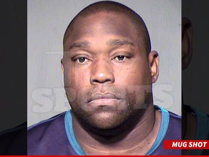 0202_warren_sapp_mug_wm