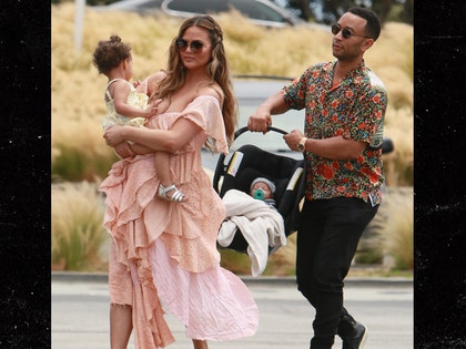 0704_Chrissy-Teigen-and-John-Legend-take-baby_PCN