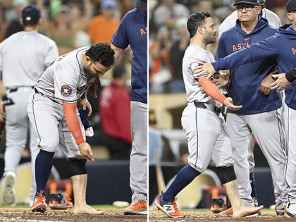 Jose Altuve With His Shoe Off During The Baseball Game