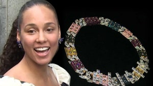 Swizz Beatz Gifts Alicia Keys Pricey LEGO-Themed Link Chain