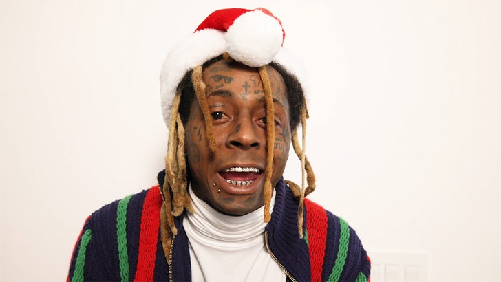 Lil Wayne et Mack Maine accueillent 150 enfants à la soirée Dave & Busters