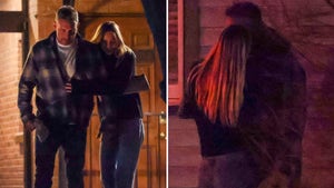 Mauricio Umansky is spotted kissing a new mystery woman in Aspen