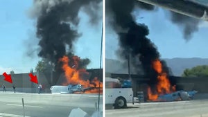 Plane Crashes Onto Freeway, Catches Fire As Passengers Escape Wreckage