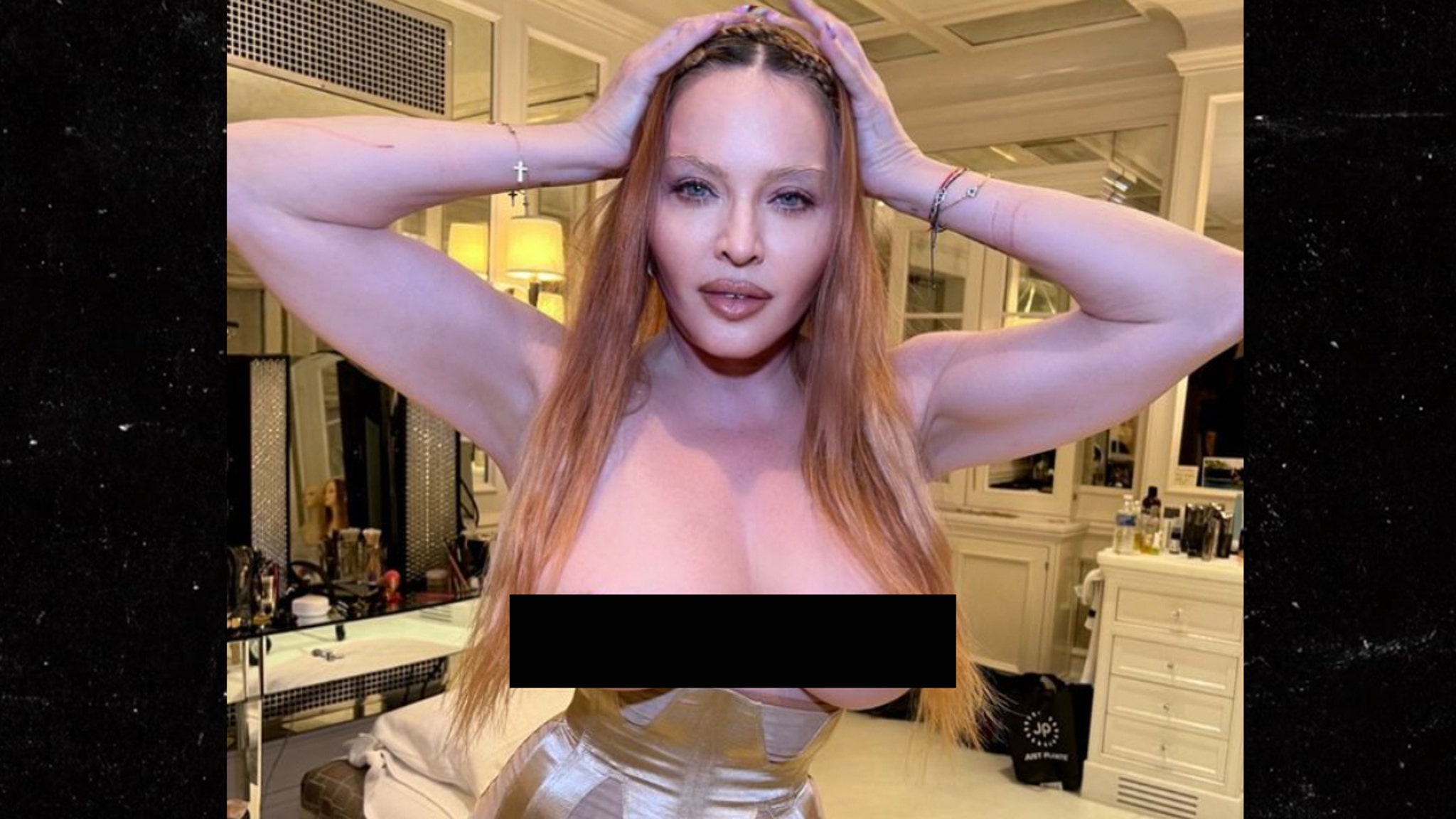 Madonna Posts Topless Photos on Social Media.