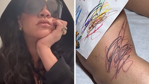 051126 rihanna tattoo primary