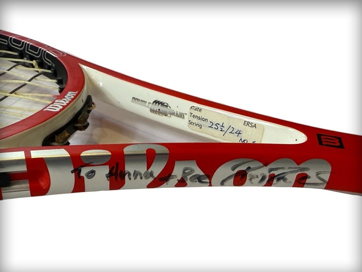 roger federer racquet signed anna wintour