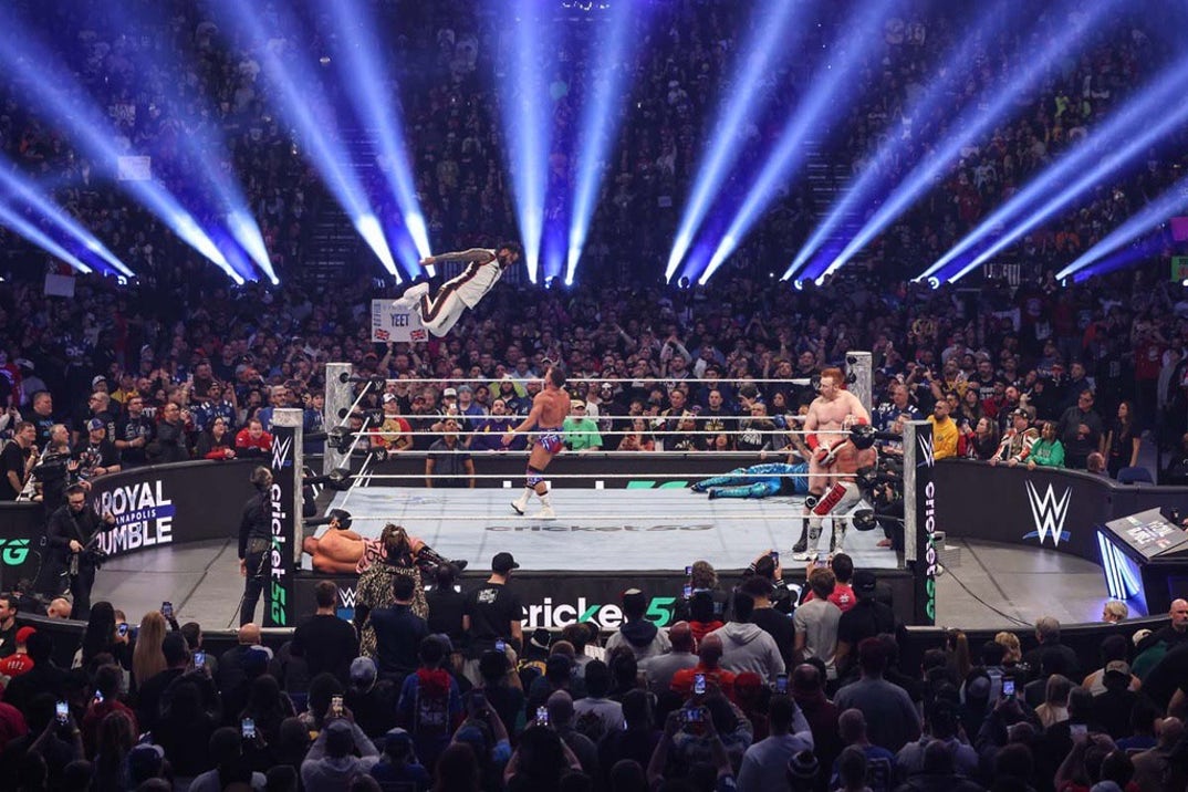 Jey Uso goes flying in the middle of a packed ring.