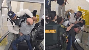 Jim Jones Brawls with Two Men on Airport Escalator, Claims Self-Defense