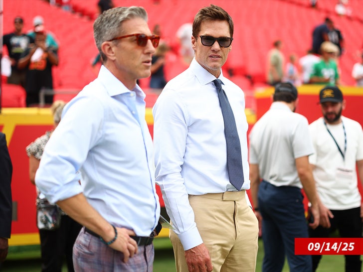 Kevin Burkhardt and Tom Brady sub getty swipe
