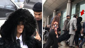 Cardi B Arrives to Court in Puffy Feather Coat with Long Train
