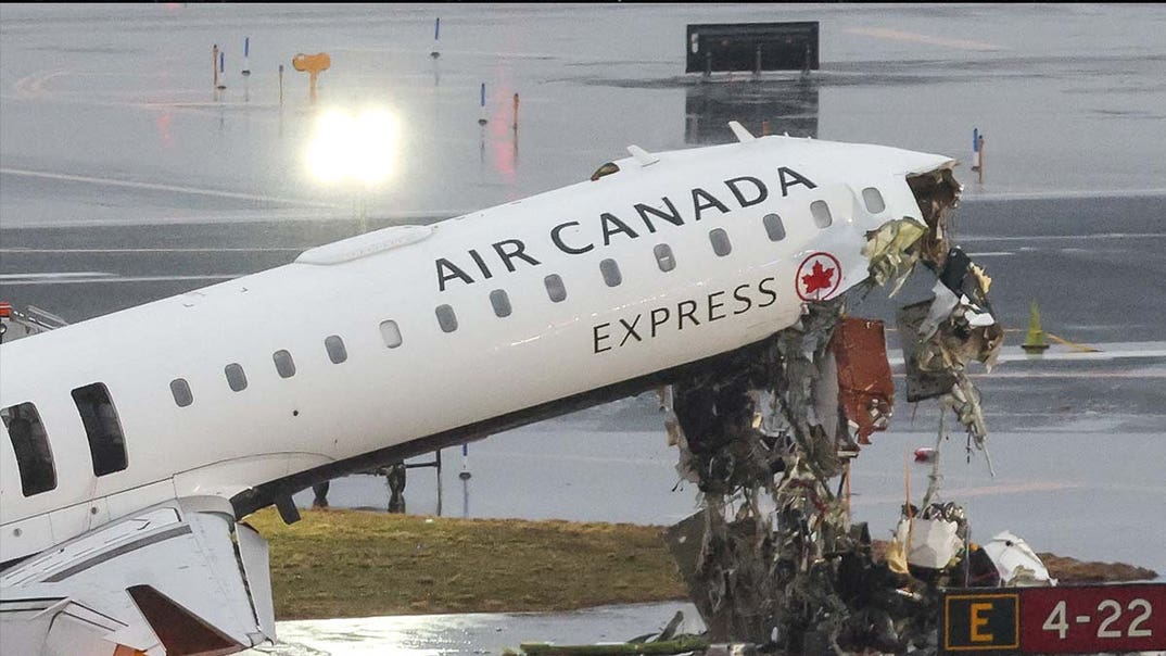 LaGuardia plane crash into fire truck