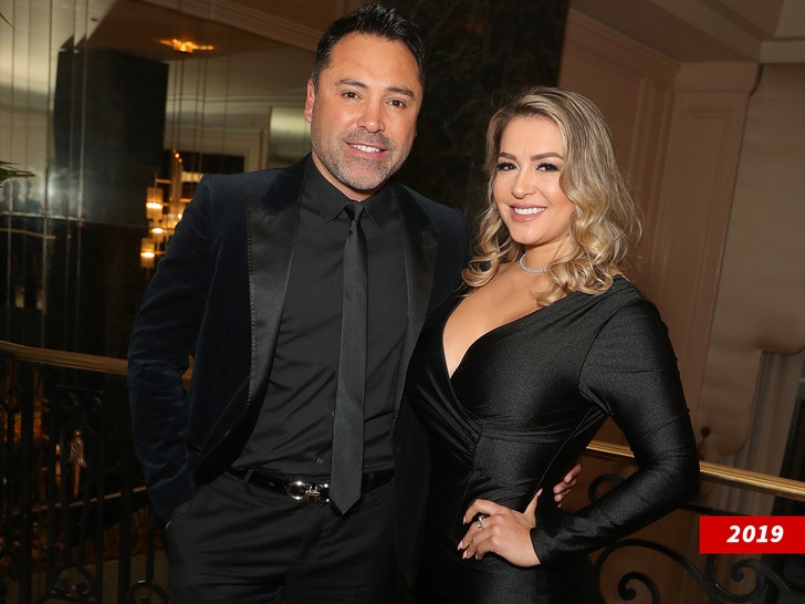 millie corretjer and oscar de la hoya getty 1
