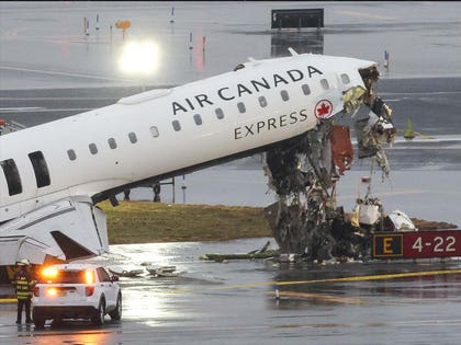 LaGuardia plane crash into fire truck