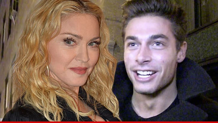 Madonna -- Eyes Fresh Young Meat And He's Totally Interested :: 0424-madonna-adrea-denver-tmz-getty-2