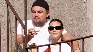 1003-Leonardo-DiCaprio-and-GF-Rome-PRIMARY