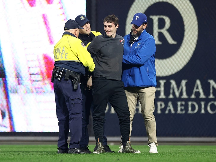 fan runs on field at phillies game getty 2