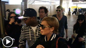 Lindsay Lohan At LAX -- From Happy to Mad in 10 Seconds