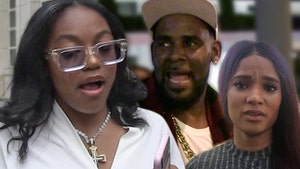 R. Kelly's GF Azriel Wants to Help Feds But Fears Legal Consequences