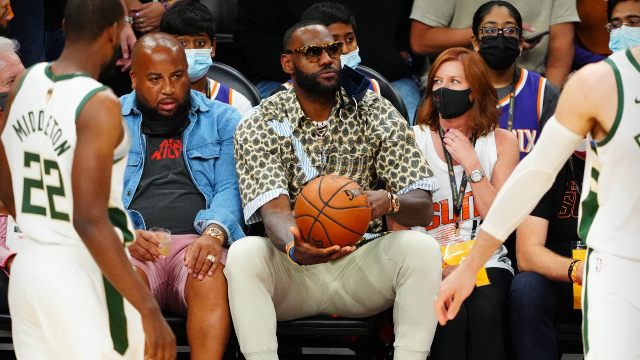 LeBron James Sits Courtside with Bottle of Tequila at NBA Finals