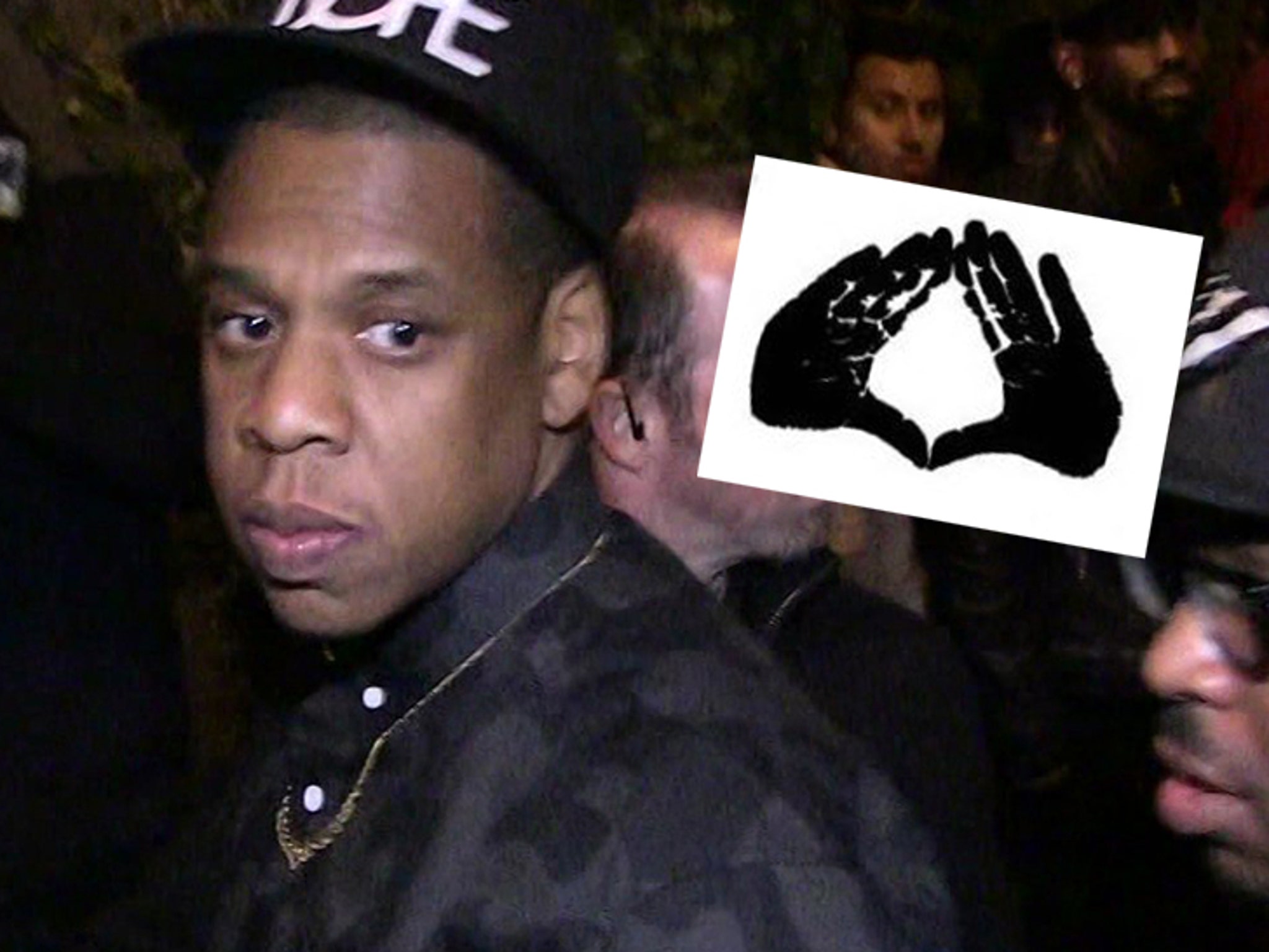 Jay-Z Hands Drink to Fan Trying to Give Him a Fist Bump