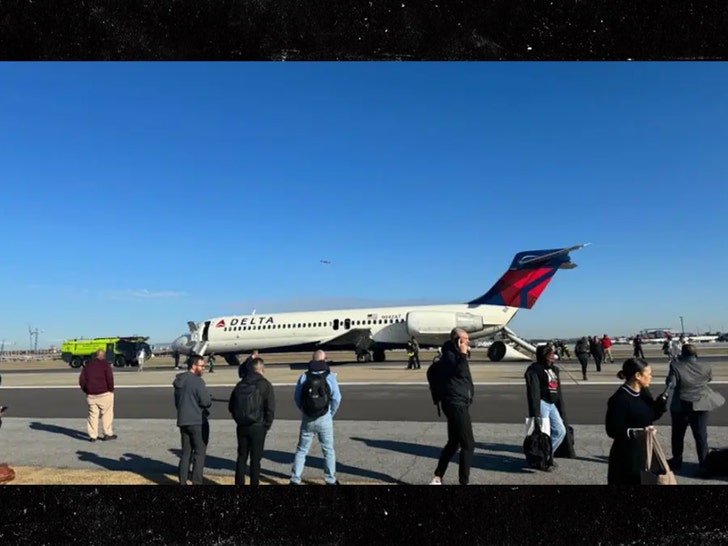 smoke on Delta plane forces passengers to evacuate via slides at Atlanta airport